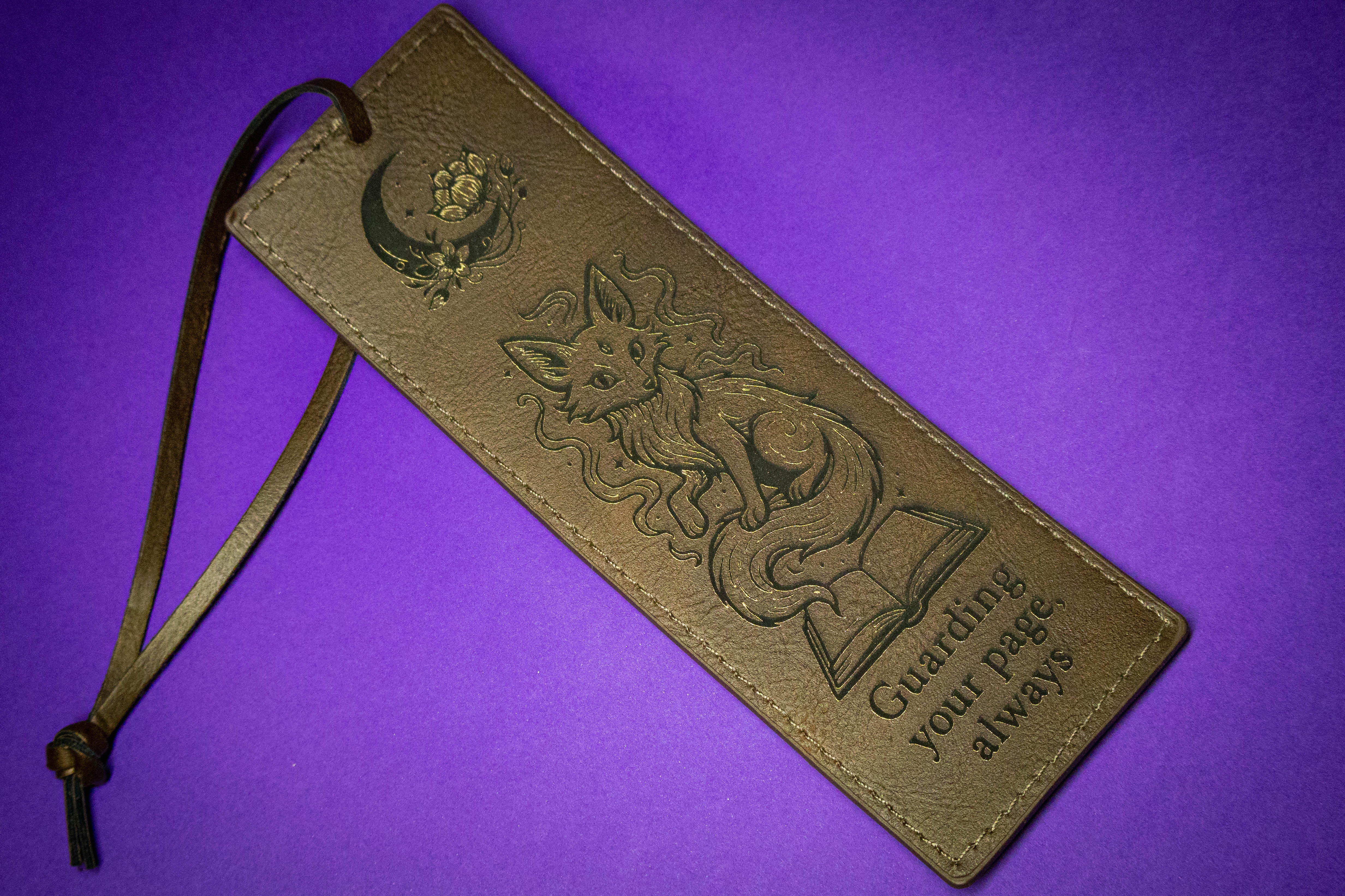 Laser engraved leather fox bookmark by Neurospice Design Shop