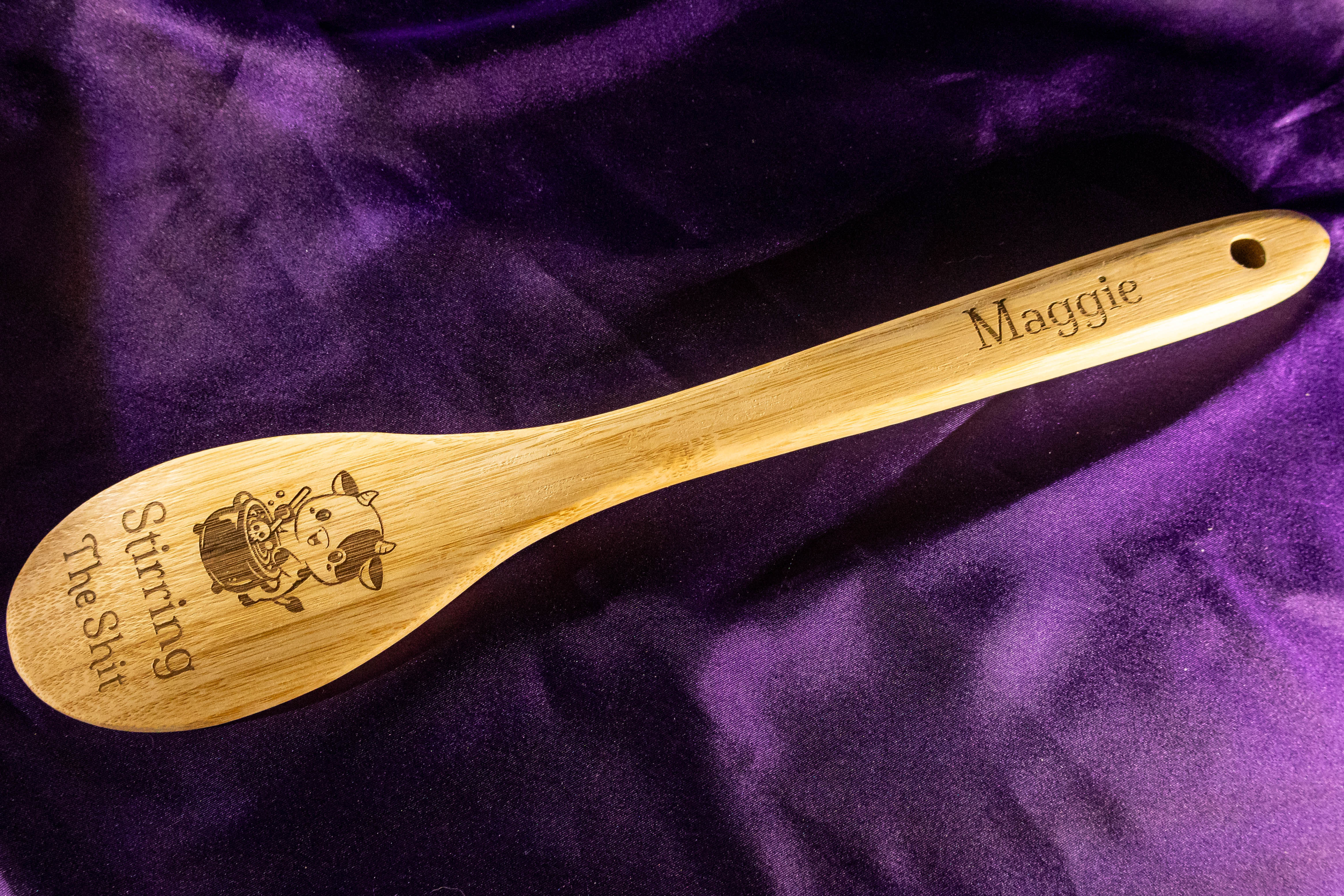 Laser engraved personalized wooden spoon with Stirring The Shit design by Neurospice Design Shop